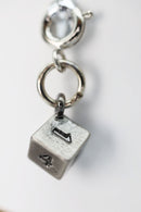 Traveler's Trinkets: D6 Charm